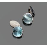CUFFLINKS

in white gold 18 kt., oval with central blue stone.

Size cm. 1,5, weight gr. 6,80.