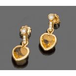 PAIR OF EARRINGS

in yellow gold 18 kt., heart shaped with central yellow topazes and diamonds .