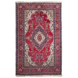 TABRIZ RUG, EARLY 20TH CENTURY

large centrel medallion and secondary motifs with flowers and