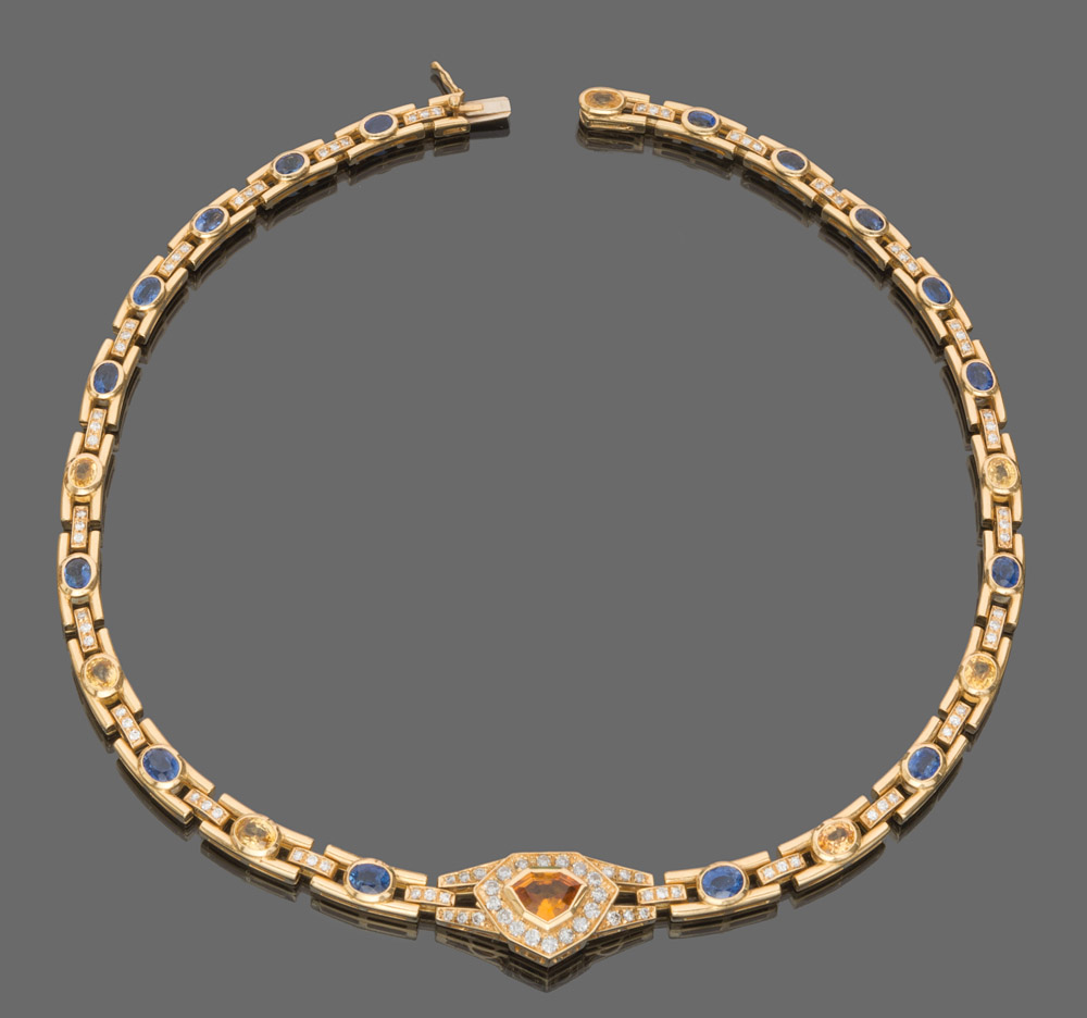 LOVELY CHOKER NECKLACE

in yellow gold 18 kt. with blue sapphires alternated by yellow sapphires and