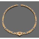 LOVELY CHOKER NECKLACE

in yellow gold 18 kt. with blue sapphires alternated by yellow sapphires and