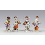 FOUR FIGURES IN PORCELAIN, PROBABLY GINORI, EARLY 20TH CENTURY

depicting young peasants, with