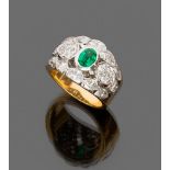 LOVELY RING

in white gold and yellow gold 18 kt., band with central emerald and diamond surround.
