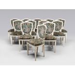 TWELVE CHAIRS IN WHITE LACQUERED WOOD, 19TH CENTURY

Louis XVI style, shield backrests. Velvet