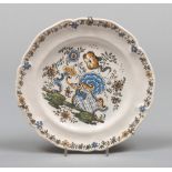 PLATE IN MAIOLICA, PROBABLY BASSANO, 19TH CENTURY

white and polychrome glazing, decorated in well