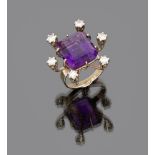 RING

in white gold, with central alexandrite stone and surround of six diamonds.

Diamonds ct. 0.60