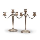 PAIR OF CANDLESTICKS IN SILVER, ITALY, MILANO 1944/1968

round base, smooth body. Three tulip