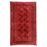 AFGAN ERSARI RUG

bokara design in octagons with clover, in centre field with red base. Main