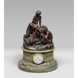 CLOCK IN MARBLE AND BRONZE, PARIS 19TH CENTURY

in two sections, upper part in burnish patina