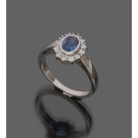 LOVELY RING

in white gold 18 kt., with oval cut central sapphire and diamond surround. 

Sapphire