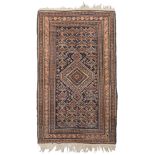 CAUCASIC GHENDIJE RUG, LATE 19TH CENTURY

diamond medallion and secondary motifs with palmette in