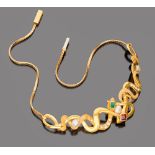 SEMIRIGID COLLAR NECKLACE 

in yellow gold 18 kt., central figure of serpent with emerald, pearls,