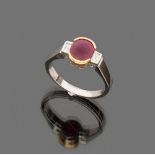 RING

in white gold and yellow gold 18 kt., with central ruby and lateral diamonds.

Ruby ct. 2.20