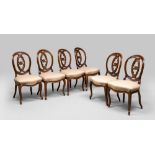 SIX CHAIRS IN WALNUT, 19TH CENTURY

with pierced medallion backrests. 

Size cm. 90 x 50 x 48.