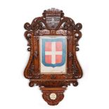 DISPLAY CASE WITH SAVOIA FLAG, EARLY 20TH CENTURY

in carved wood, foliate and floral motif, with