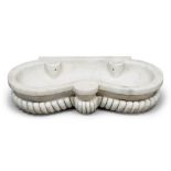 BASIN IN WHITE MARBLE, 19TH CENTURY

Size cm. 17 x 77 x 40.
