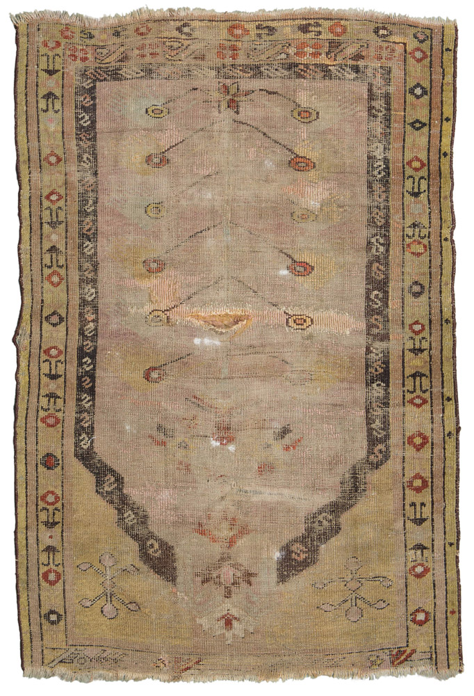 ANATOLIC MELAS RUG, 19TH CENTURY

prayer design with stylized foliate motifs on green base.   

Size