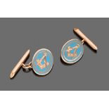 CUFFLINKS, EARLY 20TH CENTURY

oval, in yellow gold 9 kt., on blue glazed base engraved with Masonic