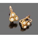 PAIR OF EARRINGS

in yellow gold 18 kt., floral motif with 6 set diamonds.

Diamonds ct. 0.75 ca.,