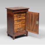 COIN CABINET IN MAHOGANY, 19TH CENTURY

parallelepiped shape and front with one door, concealing ten