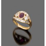 LOVELY RING

in yellow gold 18 kt., with oval cut central ruby, two lateral round cut diamonds and