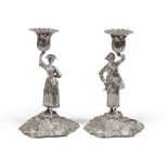 FINE PAIR OF CANDLESTICKS IN SILVER, HALLMARK LONDON 1762 

shaft with figures of pages. Floral