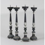 FOUR CANDLESTICKS IN METAL, PUGLIE 19TH CENTURY

black lacquer.

h. cm. 66. 

Defects.