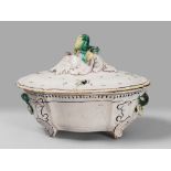 TUREEN IN MAIOLICA, LOMBARDY OR EMILIA, 18TH CENTURY

glazed white and polychrome, painted with