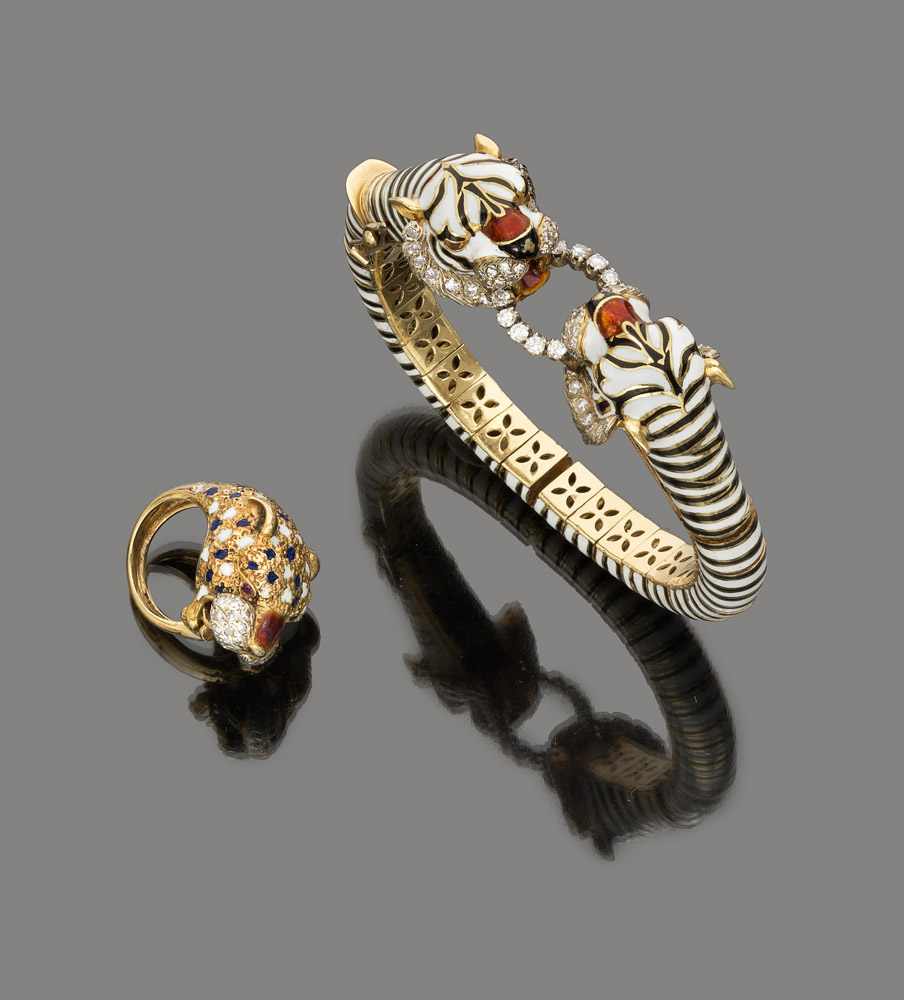 LOVELY SET WITH SEMIRIGID BRACELET AND RING

in yellow gold 18 kt., tiger head shape with polychrome