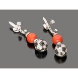 LOVELY PAIR OF ENIGMA EARRINGS BY GIANNI BULGARI 

in white gold 18 kt., with pendants in coral