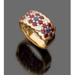 FINE RING

in yellow gold 18 kt., band with sapphires, rubies and diamonds.

Diamonds ct. 0.50