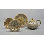 SMALL TEAPOT AND THREE SAUCERS, CANTAGALLI EARLY 20TH CENTURY

in maiolica, with pattern of stars in