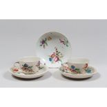 TWO CUPS AND THREE SAUCERS IN PORCELAIN, 18TH CENTURY

glazed white and polychrome, with floral