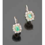 LOVELY PAIR OF EARRINGS

in white gold and yellow gold 18 kt., with central emerald and surround