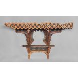 ARAB SHELF, LATE 19TH CENTURY

in carved wood, with inserts in mother of pearl. 

Size cm. 74 x