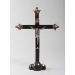 CRUCIFIX IN SILVER, 18TH CENTURY

with Christ. Cross in ebonized wood. 

Size cm. 65 x 45.