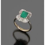 LOVELY RING

in white gold 18 kt., with rectangular cut central emerald and baguette cut diamond