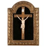 SCULPTURE OF CHRIST IN IVORY, 18TH CENTURY

mounted on wooden cross, within a carved giltwood frame.