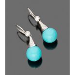 PAIR OF EARRINGS

in white gold 18 kt., with turquoise spherical pendant and set diamonds.

Length
