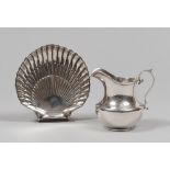 SILVER ASHTRAY AND LITTLE PITCHER, USA 20TH CENTURY Measurements ashtray cm. 15 x 15. Measurements