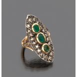 BEAUTIFUL RING in yellow gold 18 kts. and silver, with three central emeralds and contour of small