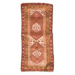 KAZAK BORDJALU CARPET, FIRST HALF 20TH CENTURY to double polygonal medallion with symbolic