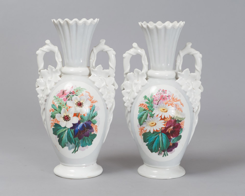 A PAIR OF PORCELAIN JARS, LATE 19TH CENTURY white enamel and polychrome decoration with flowers to