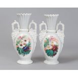 A PAIR OF PORCELAIN JARS, LATE 19TH CENTURY white enamel and polychrome decoration with flowers to