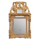 GILDED AND CARVED WOOD FRENCH MIRROR OF LOUIS 15TH STYLE, 17TH CENTURY carved with flowers and