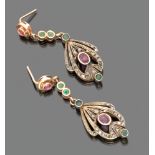 A PAIR OF OLD EARRINGS in gold and silver, with elements leaf decorated pendants with small emeralds