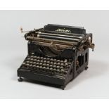 TYPEWRITER OLIVETTI, EARLY 20TH CENTURY in black lacquer metal. Measurements cm. 24 x 40 x 35.