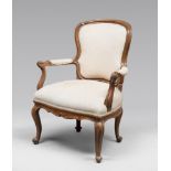 BEAUTIFUL WALNUT ARMCHAIR, PROBABLY LOMBARDY 18TH CENTURY with wide back, shaped arms and curled
