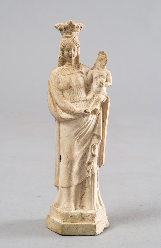 EARTHENWARE FIGURE, PROBABLY FRANCE 19TH CENTURY entirely of white enamel, depicting the Madonna and