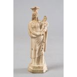 EARTHENWARE FIGURE, PROBABLY FRANCE 19TH CENTURY entirely of white enamel, depicting the Madonna and